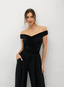 Czarny top Nela zestawiony z eleganckimi szerokimi spodniami