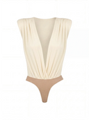 Damskie body Maelle w odcieniu butter yellow wyeksponowane na jasnym tle